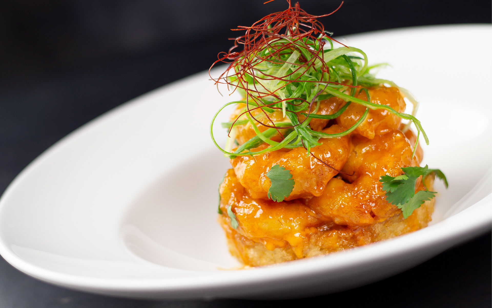 Pair our House Golden Pilsner with the Firecracker Shrimp from Yard House.