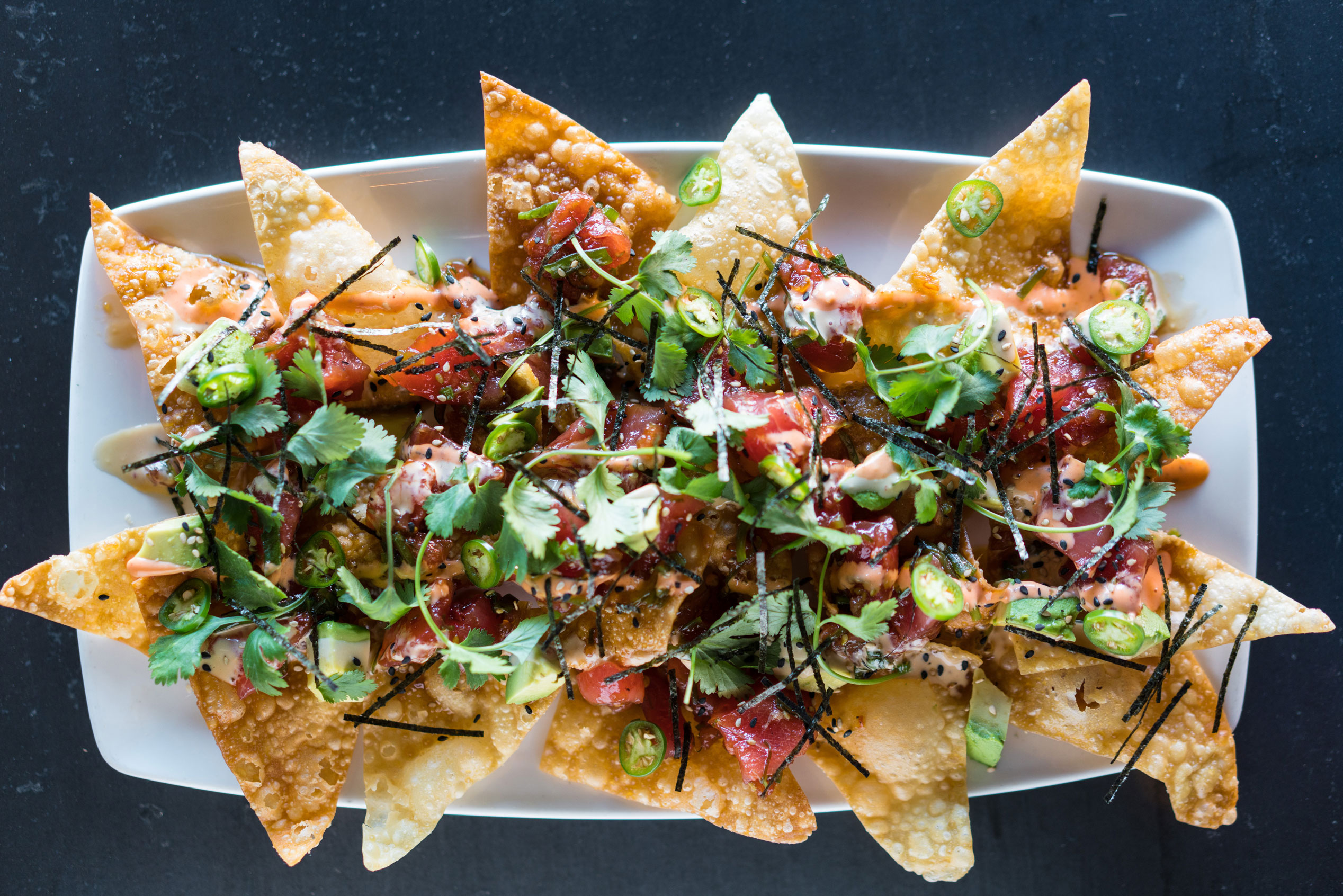 Pair our House Belgian White with the Poke Nachos from Yard House.