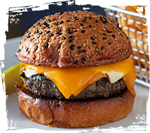 Bite into the Classic Cheese Burger from Yard House.