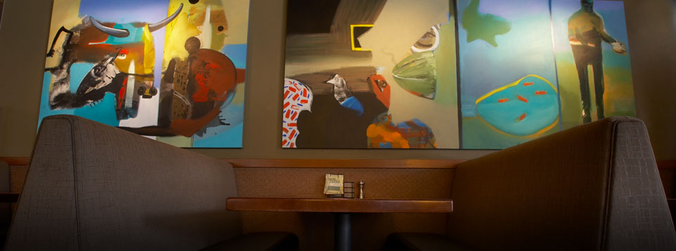 Paintings hanging on the wall in Yard House